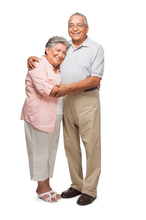 an older couple dressed smartly in a partial embrace